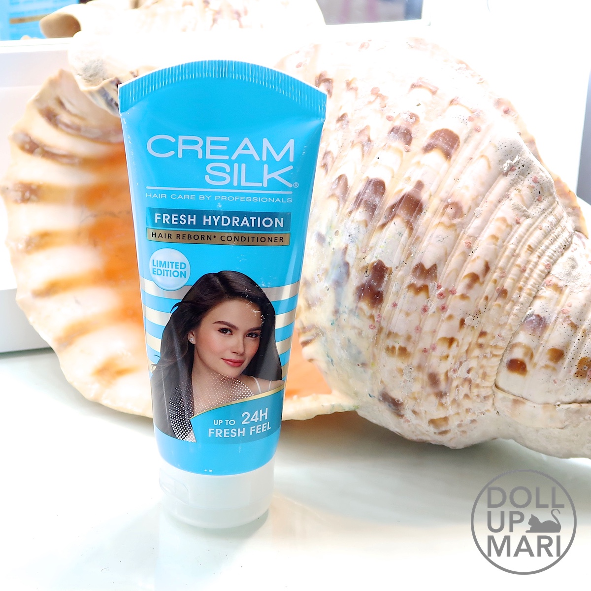 Cream Silk Fresh Hydration Conditioner 170mL Pack Shot Against Shell Background