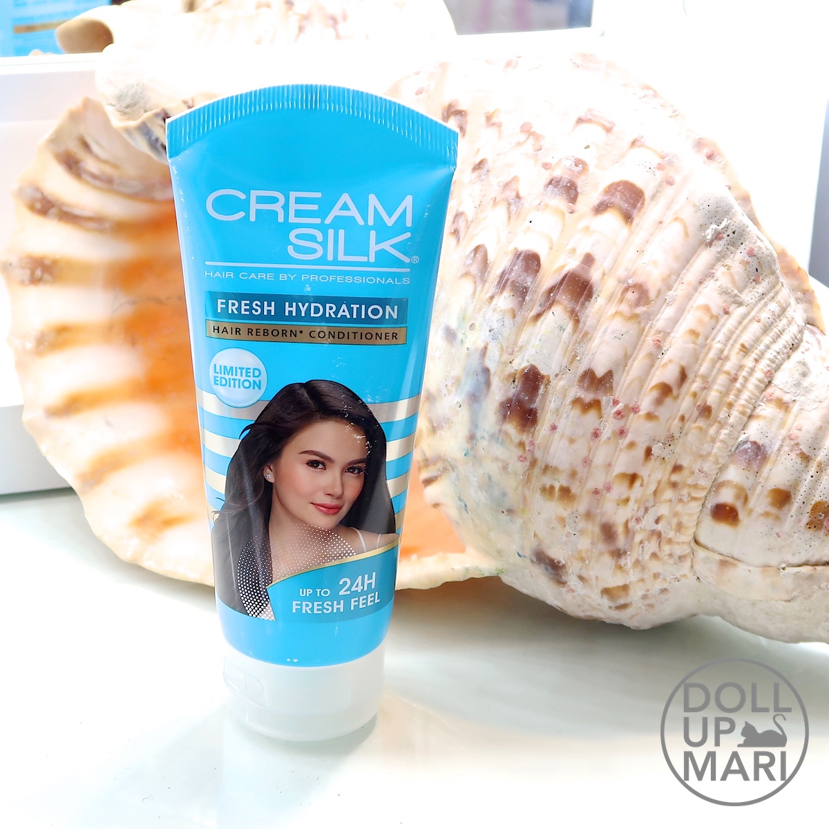 Cream Silk Fresh Hydration Conditioner 170mL Pack Shot Against Shell Background