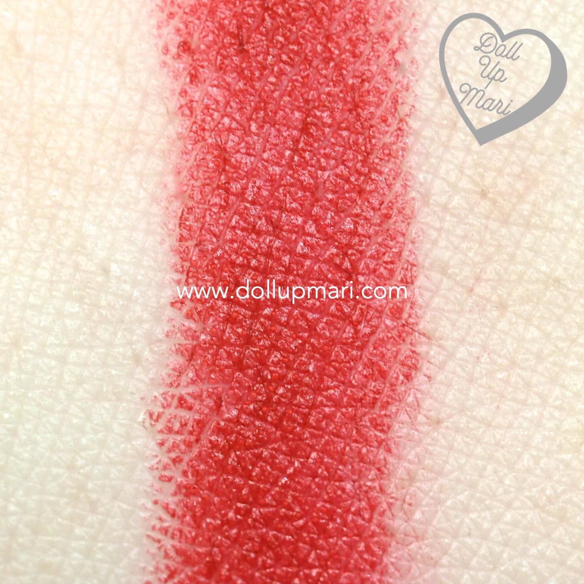 Swatch of red side of BLK Cosmetics K-Beauty K-Drama All-Day Intense Matte Lipstick in the shade of Dandelion