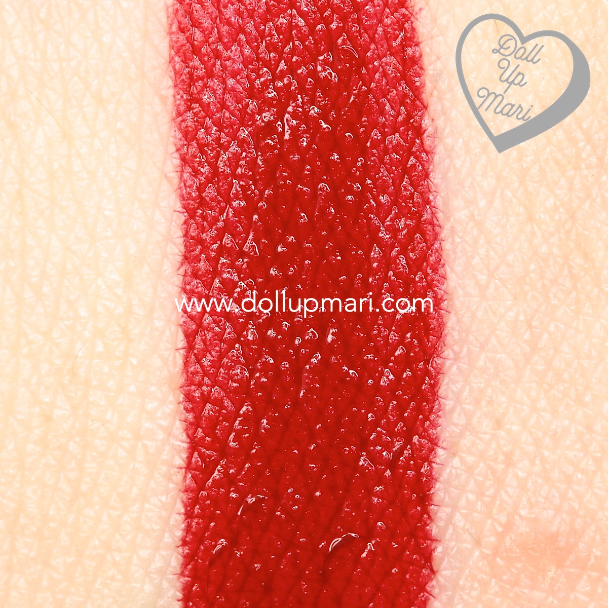 Swatch of 295 Dauntless shade of Maybelline Superstay Matte Ink Liquid Lipstick Rogue Reds