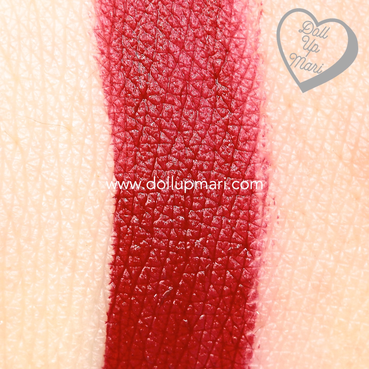 swatch of 310 Achiever shade of Maybelline Superstay Matte Ink Liquid Lipstick Rogue Reds collection