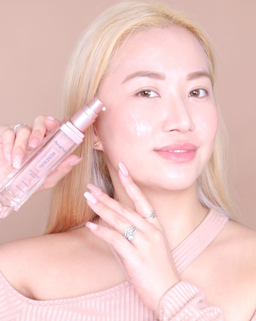 Mari Posing with AVON ANEW Renewal Serum