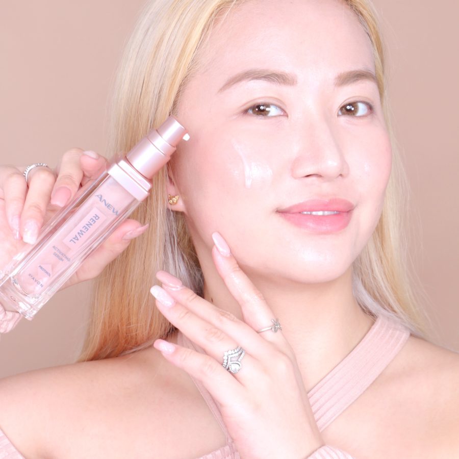 Mari Posing with AVON ANEW Renewal Serum